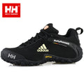 Νέες ανδρικές μπότες εργασίας Helly Hansen και adidas με ατσάλινη μύτη, ανθεκτικές σε θραύση και τρυπήματα.